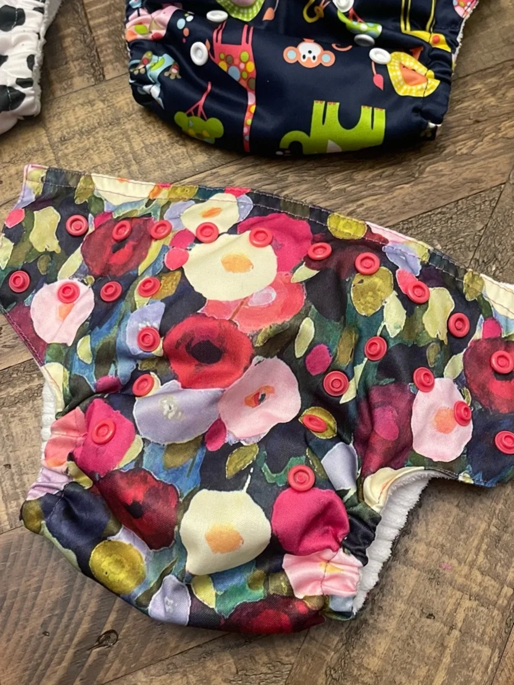 Sunbaby reusable cloth baby diapers with adjustable snaps to grow with baby